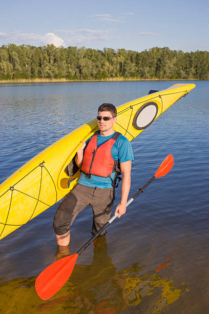 istock Men travel by canoe on the rive 527042906