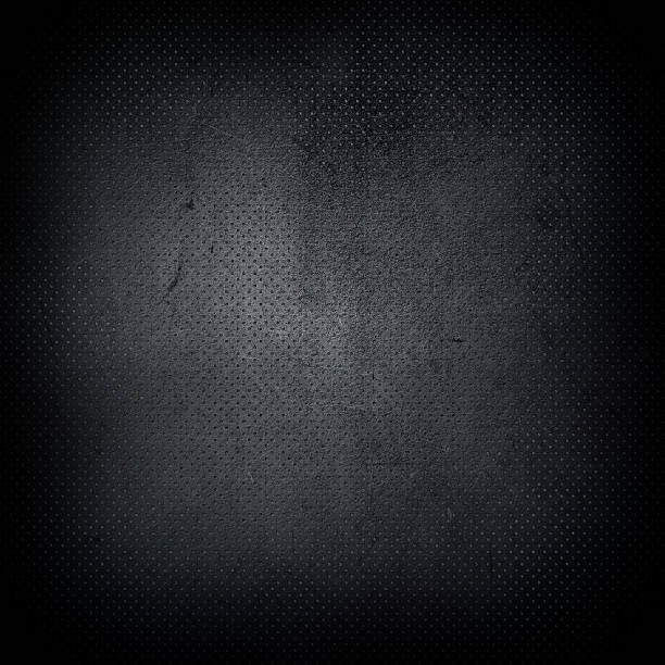 Dark grunge perforated metal background Dark grunge style perforated metal background riveted metal texture stock pictures, royalty-free photos & images