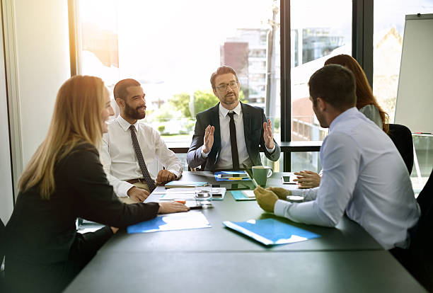 istock Staying in the business loop with regular management meetings 527045112