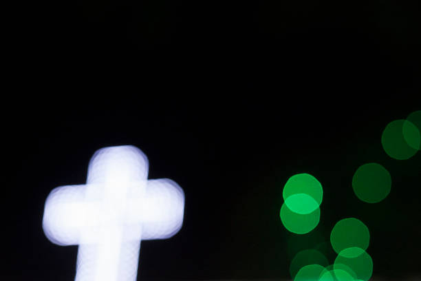 istock bokeh background in green and white with cross sign 527046030