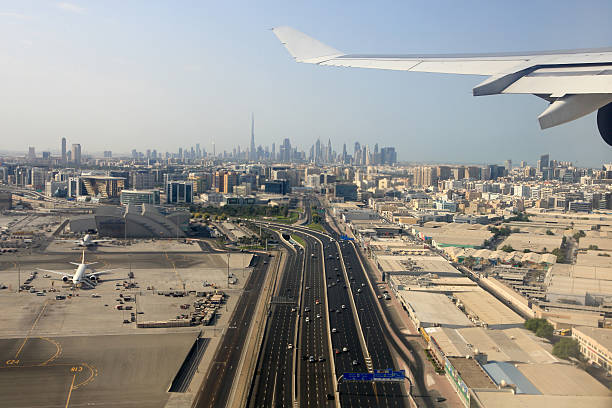 istock Aerial view on Dubai Airport and Downtown UAE 527048799