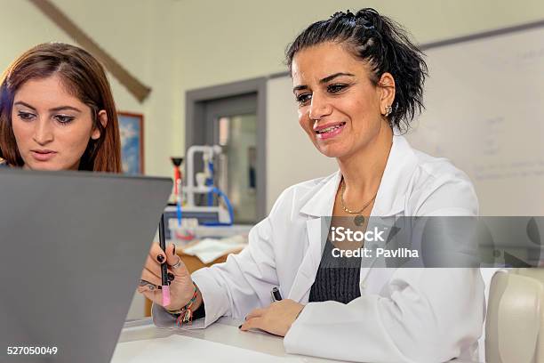 Turkish Teacher And Student In Biology Chemistry Lab Researching Istanbul Stock Photo - Download Image Now