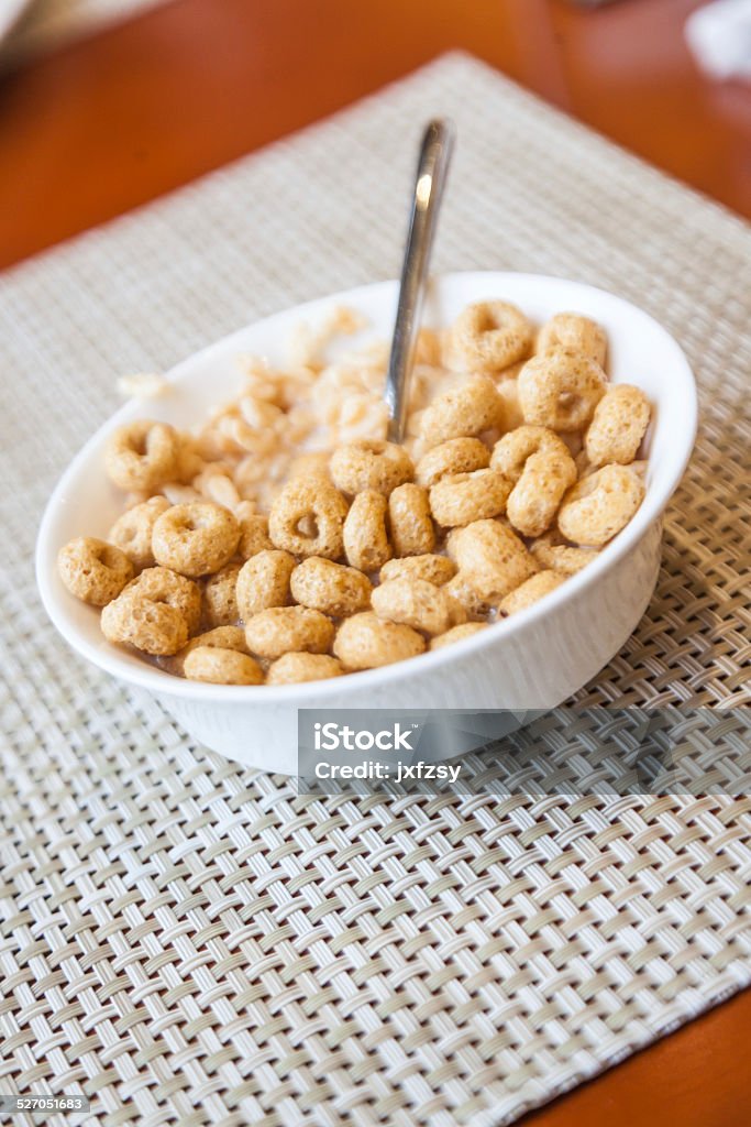 cereal breakfast cereal ring breakfast on blue china bowl Blue Stock Photo