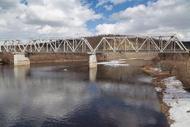 istock Steel railway bridge over the river Chulman 527051752