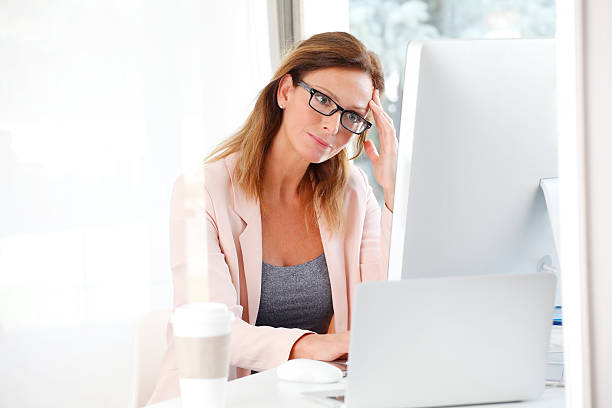 istock Stressed businesswoman 527052180
