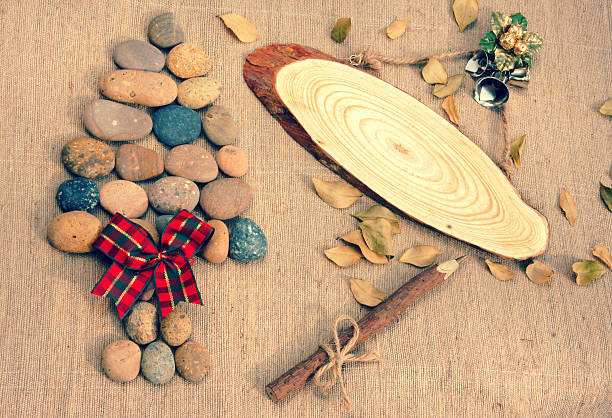istock Christmas tree, pebble, wooden pen, Xmas message 527055243