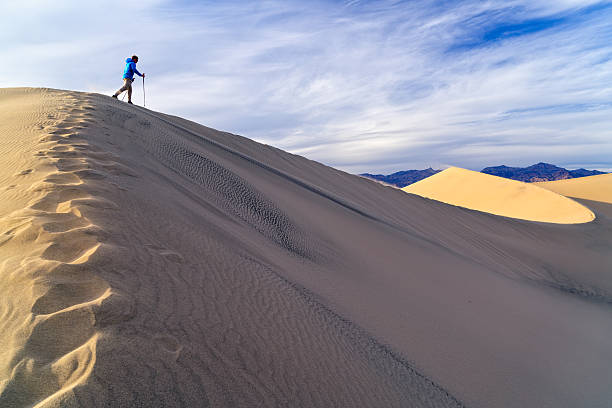 istock Hiking Sand Dunes in Death Valley 527057388