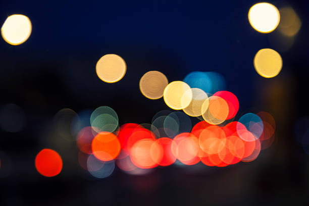 istock Night traffic blur bokeh background,colorful background 527069709