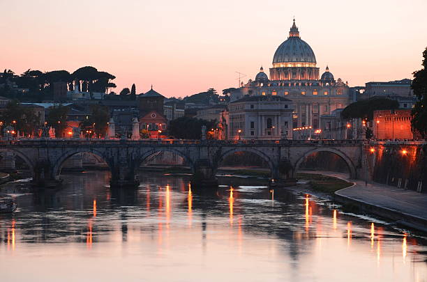 istock St. Peters Basilica over Tiber at sunset in Rome, Italy 527069779