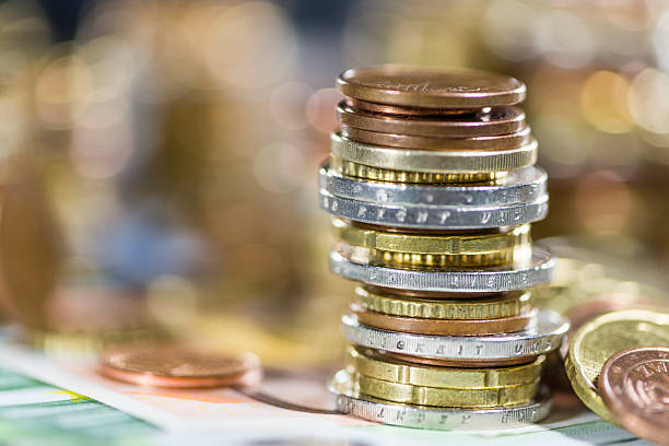 istock Euro Coins and Bills 527070859