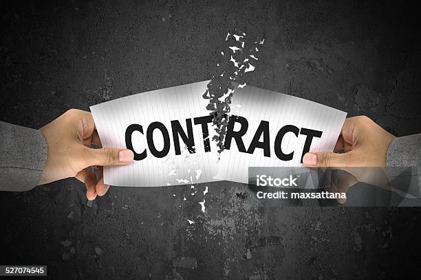 Businessman Stress Ripping Up Contract Word On Paper Stock Photo - Download Image Now