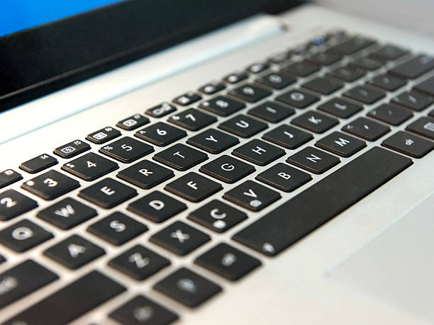 istock laptop keyboard with black keys closeup 527074657
