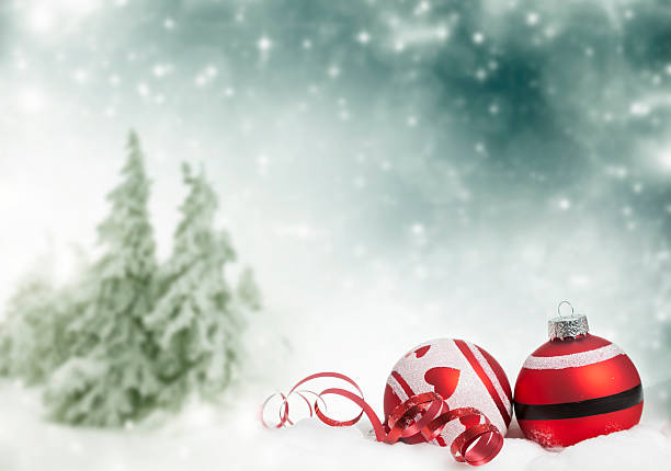 istock Red Christmas decorations in the snow 527086869