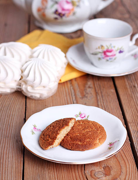 istock Tea time with cookies and zephyr 527087141
