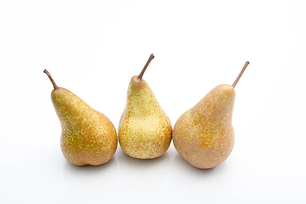 Three Isolated Pears stock photo