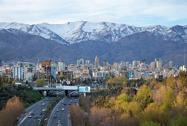 istock Tehran Skyline and Highway in Front of Snowy Mountains 527089313