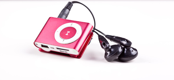 red mp3 player over white backround