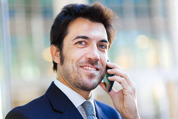 istock Handsome businessman talking on the mobile phone 527089613