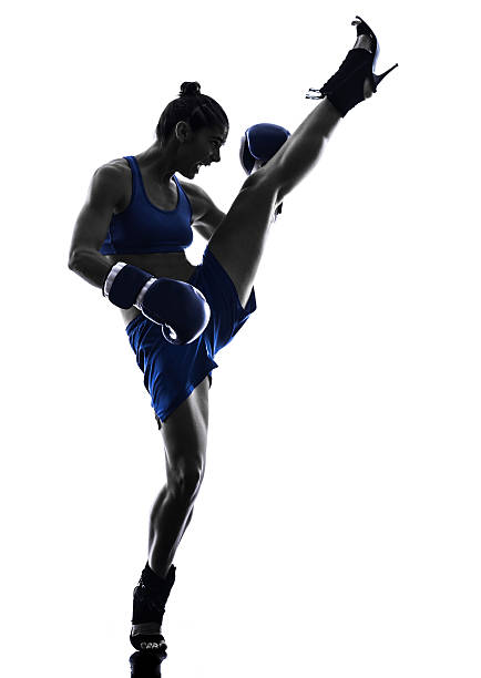 istock woman boxer boxing kickboxing silhouette isolated 527090703