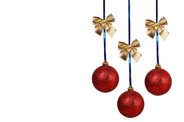 istock Three red Christmas balls with golden bows 527091611