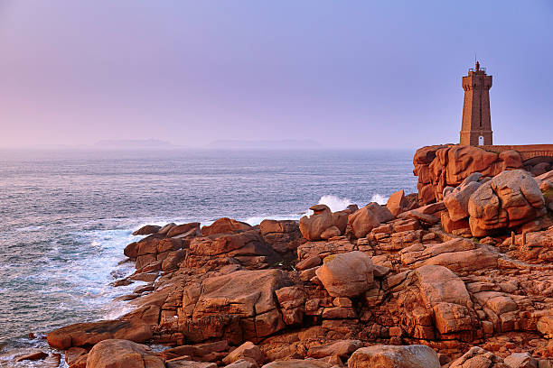 istock Scenic view of pink granite coast at sunset 527091641