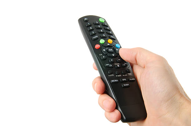 istock TV remote control in hand isolated on white 527092047