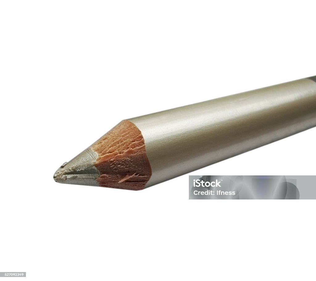 Part of metallic cream eyeshadow pencil Part of metallic cream eyeshadow pencil white silver color closeup isolated on white. Arts Culture and Entertainment Stock Photo