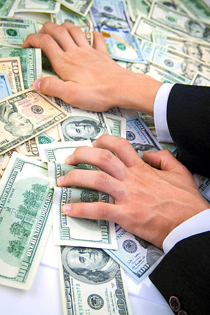 istock Grabbing American Dollars 527092365