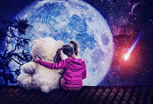 istock Small cute girl sitting with toy bear 527093615