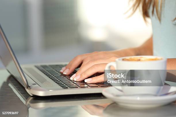 Woman Hands Typing In A Laptop In A Coffee Shop Stock Photo - Download Image Now - Adolescence, Adult, Asking