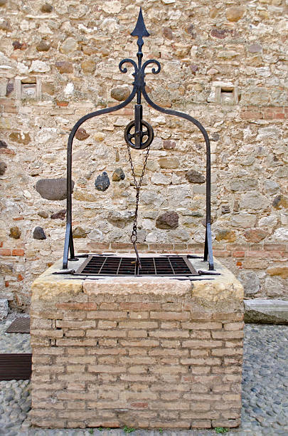 istock ancient well in marble and stone 527111675