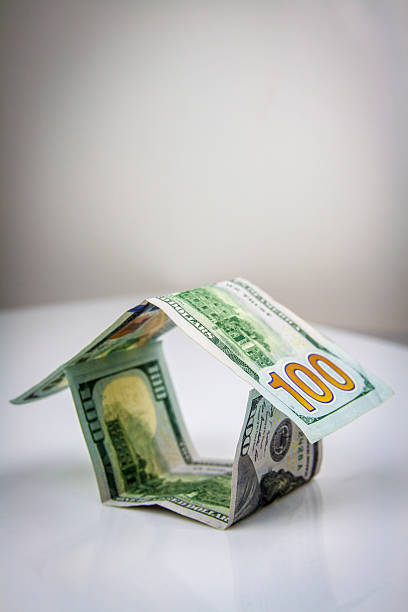 istock House made of american dollars 527113461