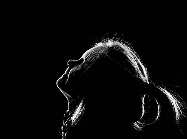 istock Little girl looking up 527114685