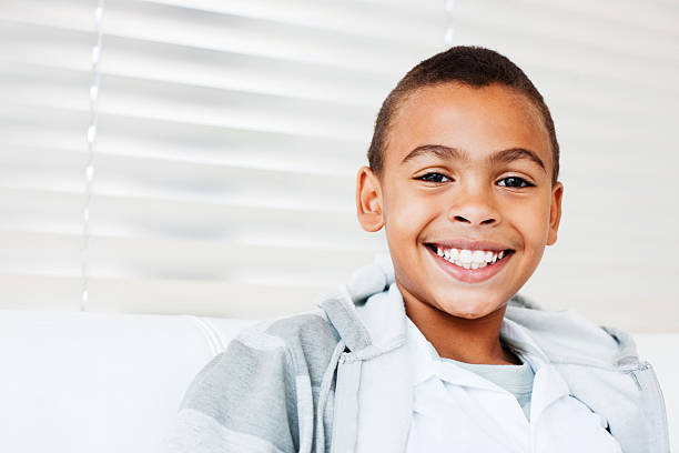 istock Cute African American boy smiling 527116753