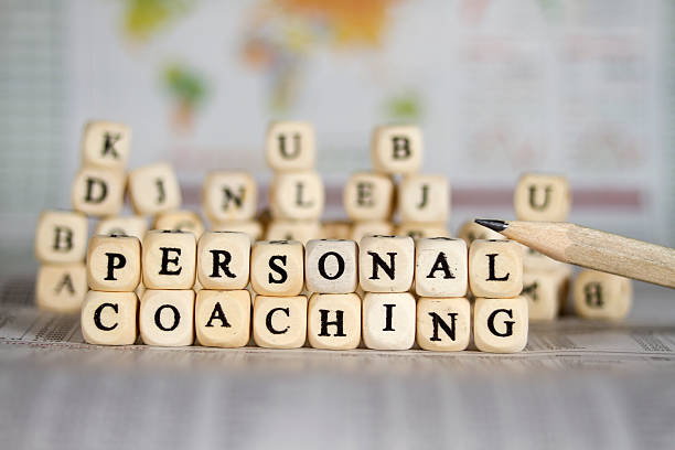 personal coaching word on newspaper background stock photo