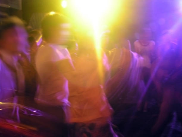 istock young people party dance in light 527118711