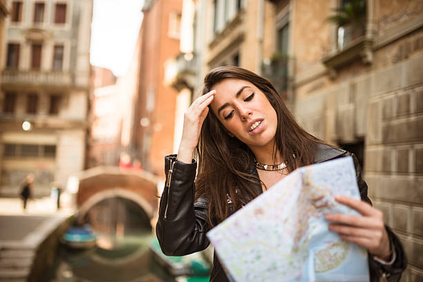 istock tourist reading a map in Venice 527119025