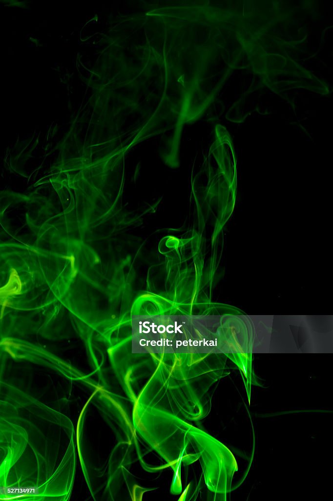 Green smoke on black background. Abstract Stock Photo