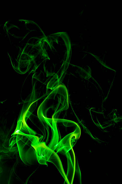istock Green smoke on black background. 527134983