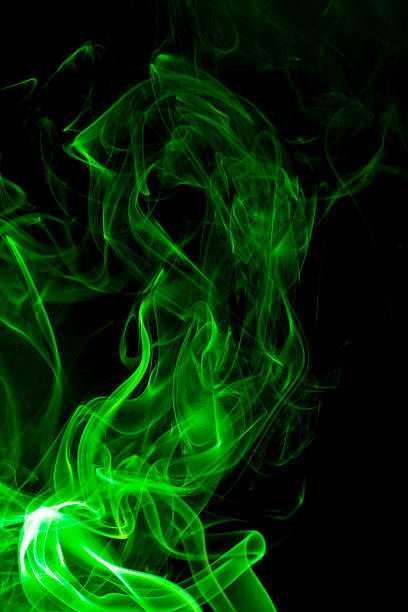 istock Green smoke on black background. 527134989