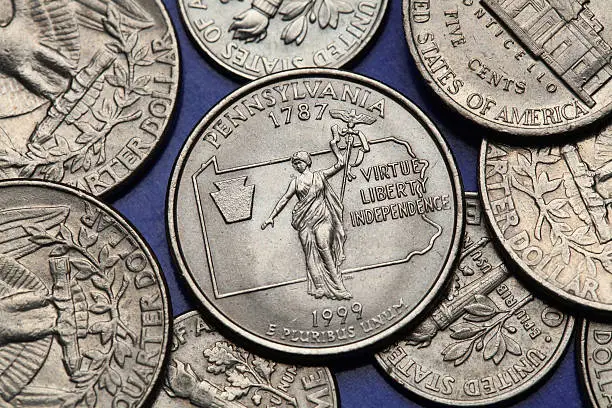 Coins of USA. Commonwealth statue in Harrisburg, Pennsylvania, depicted on the US Pennsylvania quarter.