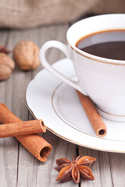 istock Porcelain coffee cup. Garnish with star anise, cinn 527135195