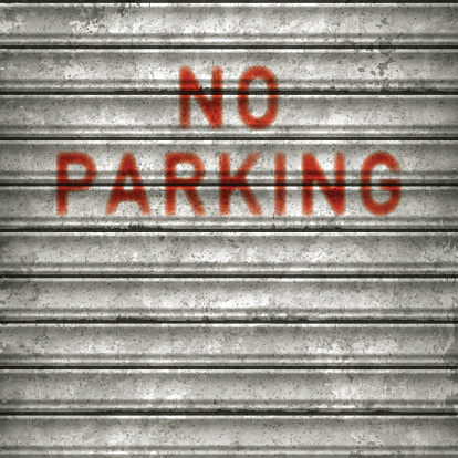 Rusty metallic rolling garage door with red text reading NO PARKING. Photorealistic vector illustration. Individual elements and textures. Layered EPS10 file with transparencies and global colors. Hi-res JPG included. Related images linked below.