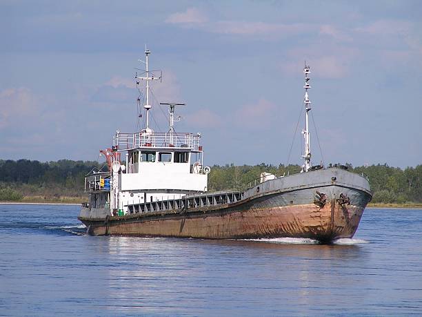 istock Self-propelled cargo barge on the river Yenisei. 527136721
