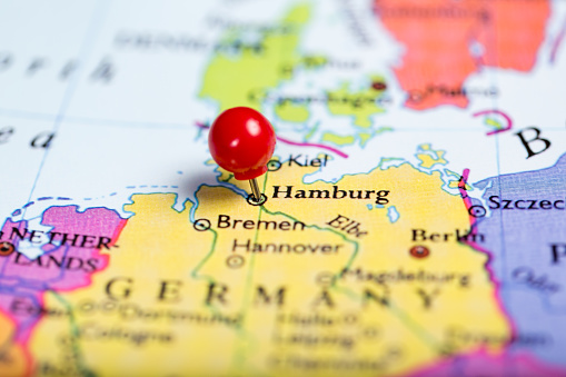 Red push pin on map of Germany