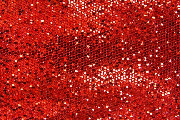 Photo of red sequins textile background