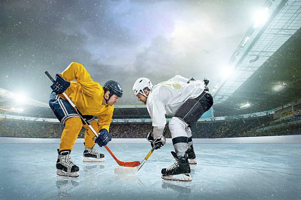 istock Ice hockey player on the ice. Open stadium 527139963