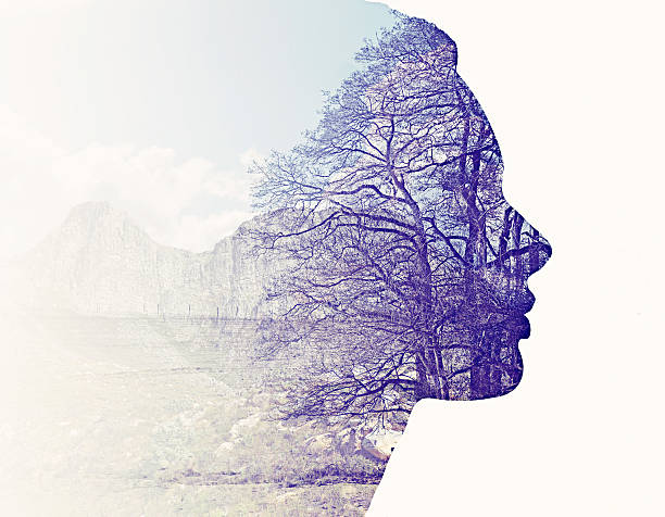 We are all part of nature Composite image of nature superimposed on a woman&#039;s profilehttp://195.154.178.81/DATA/i_collage/pi/shoots/784626.jpg multiple exposure photos stock pictures, royalty-free photos & images