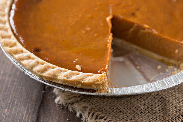 Pumpkin Pie With Missing Slice stock photo
