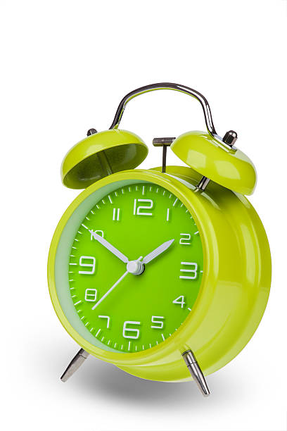 istock Green alarm clock with the hands at 10 and 2 527170961